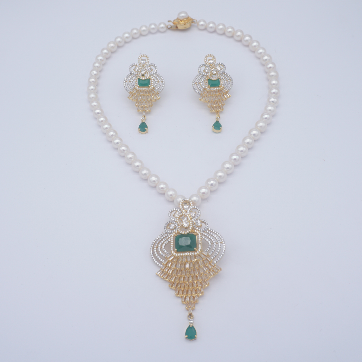 Fresh Water single row round shape white colour pearls & coloured stones in locket & earings