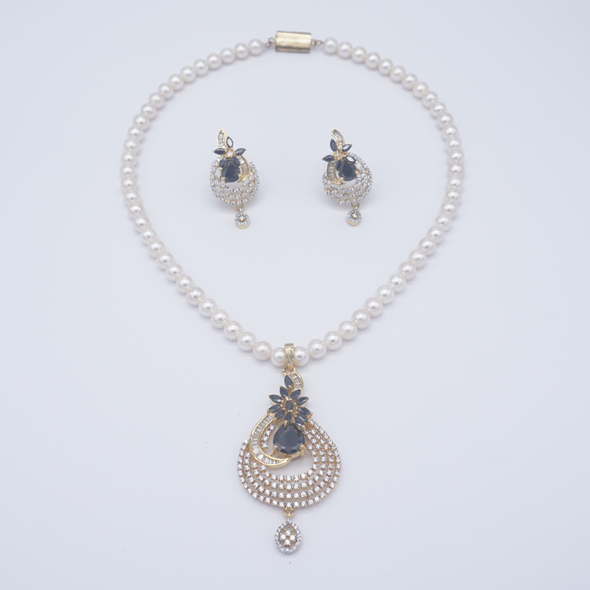 Fresh Water single row round shape white colour pearls & coloured stones in locket & earings